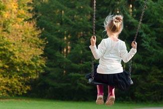Orthokeratology Child in swing