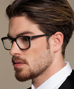 Guy model wearing Gold and Wood eyeglasses