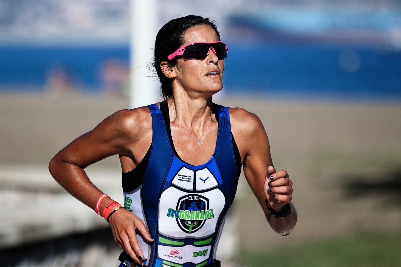 woman running sunglasses