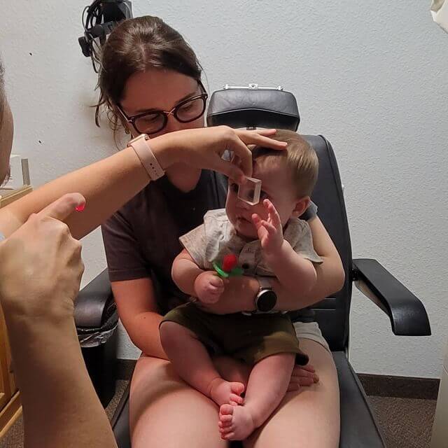 baby at an eye exam 640×640