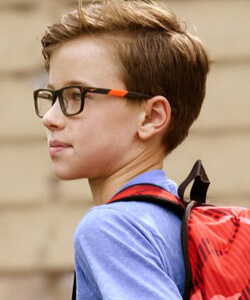 a boy with nike eyeglasses