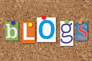 the word blog on a pinboard