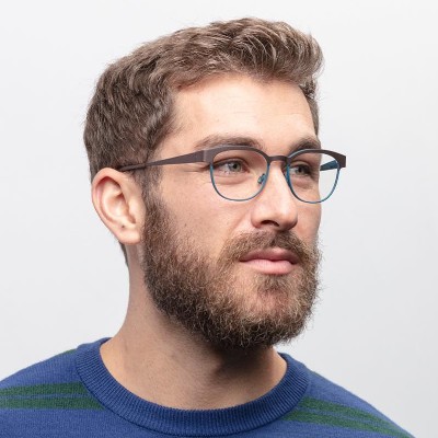 bearded man wearing bevel eyeglasses