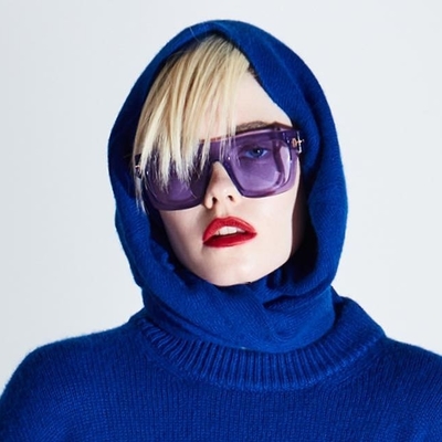 woman wearing tom ford purple tinted sunglasses