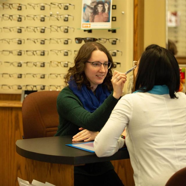 Woman selecting glasses