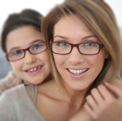 mother and child wearing glasses