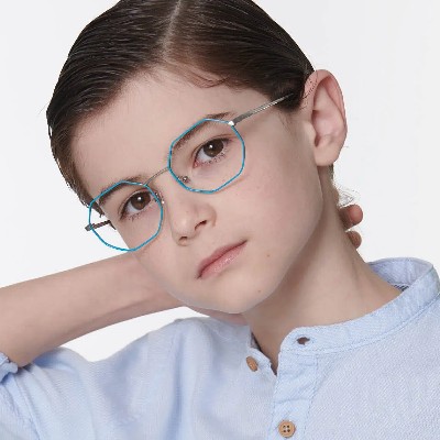 little boy wearing blue colored nano vista eyeglasses.jpg