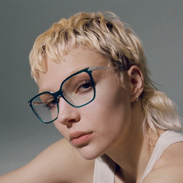 blond woman wearing calvin klein eyeglasses