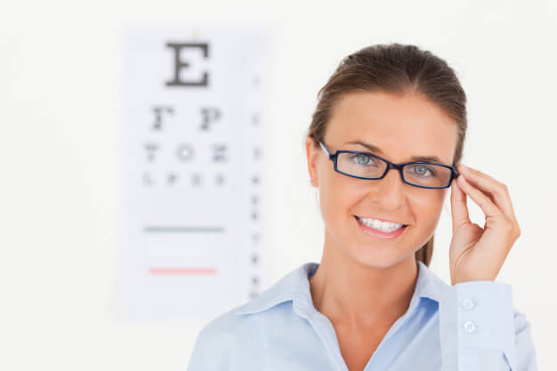 Woman with Glasses and Eyechart
