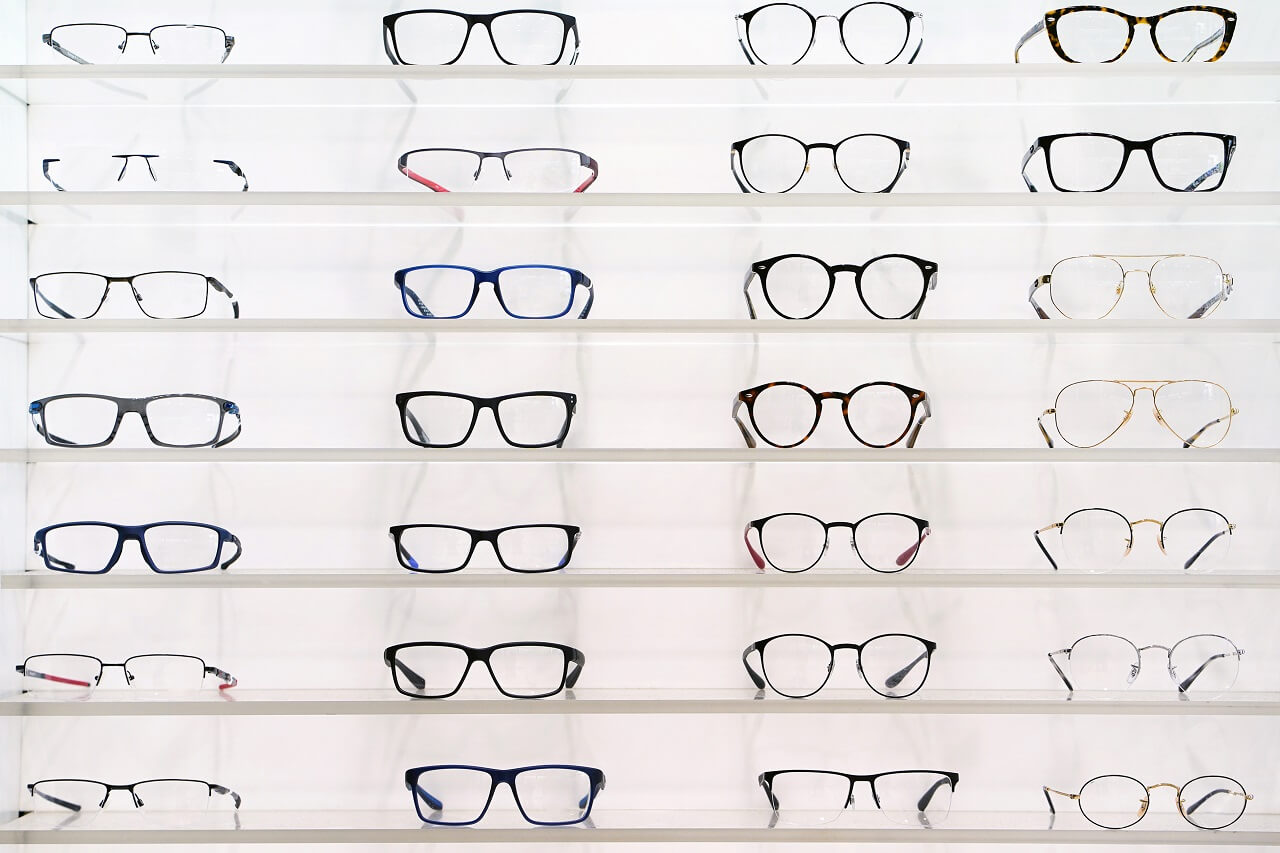 eyeglasses on wall display