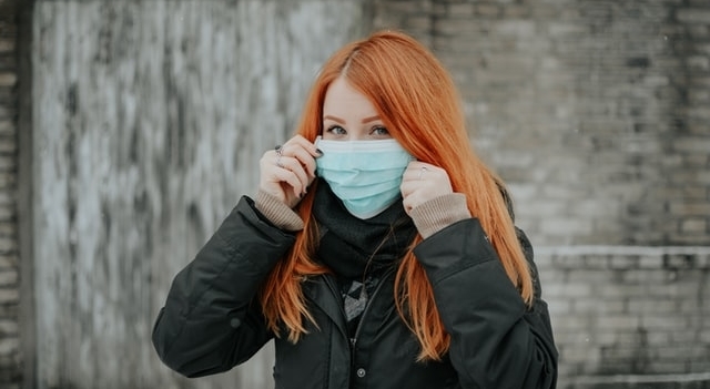 woman red hair wearing a mask 640×350