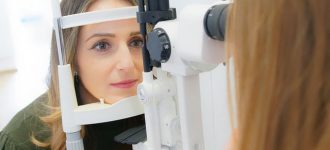 women getting an eye exam 330x150