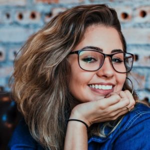 girl-smiling-wearing-eyeglasses-640-e1642607397973-300x300