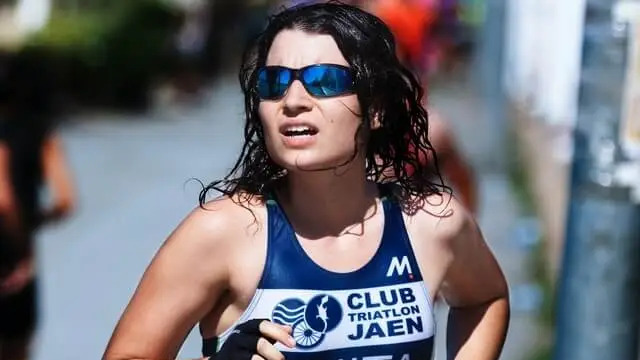 woman wearing sports sunglasses