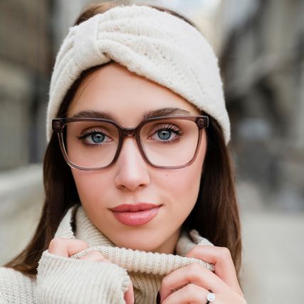 woman wearing brown toplook eyeglasses