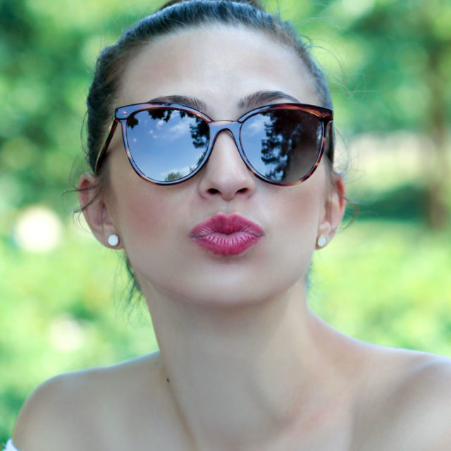 woman wearing designer sunglasses in Maryville, Tennessee