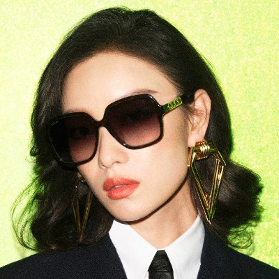 woman wearing gucci sunglasses