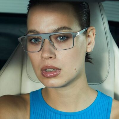 woman wearing square shaped icberlin eyeglasses