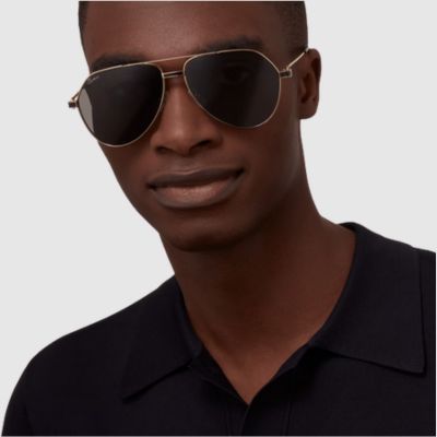 black man wearing cartier sunglasses