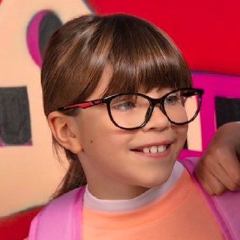 girl wearing puma kids eyeglasses