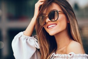 young woman brunette sunglasses