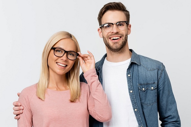 happy couple modeling eyeglasses studio 640px 1