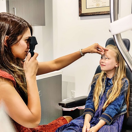 optometrist young girl eye exam