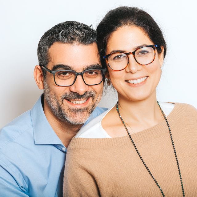 happy couple wearing glasses