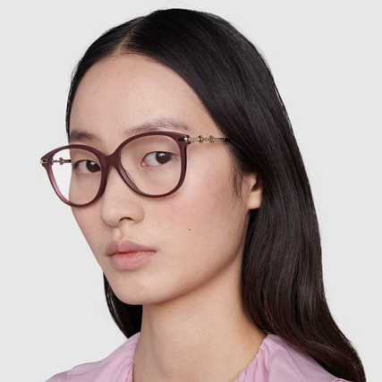asian woman wearing cat eyes gucci eyeglasses