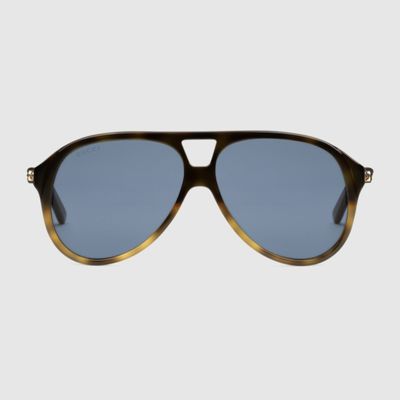 pair of aviator blue tinted gucci sunglasses