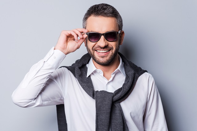 businessman modeling sunglasses