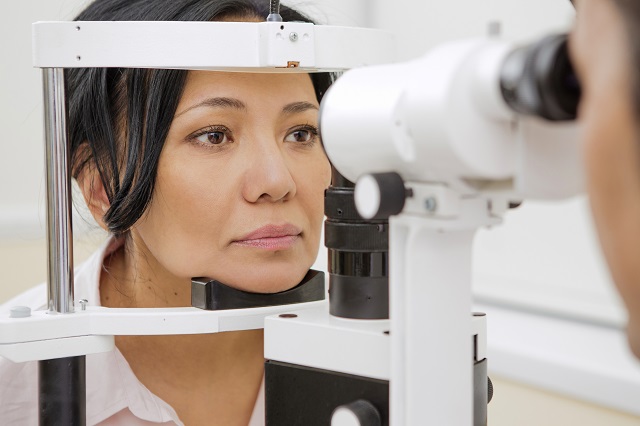 woman eye examination optometrist