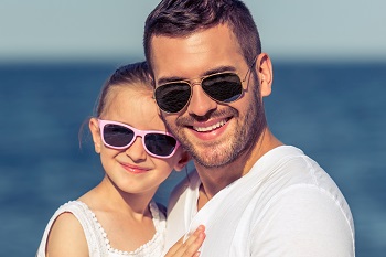 father daughter modeling sunglasses
