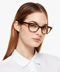 girl wearing kate spade eyeglasses