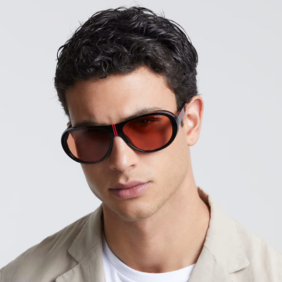 man wearing red guess sunglasses