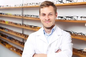 male optician in optical boutique