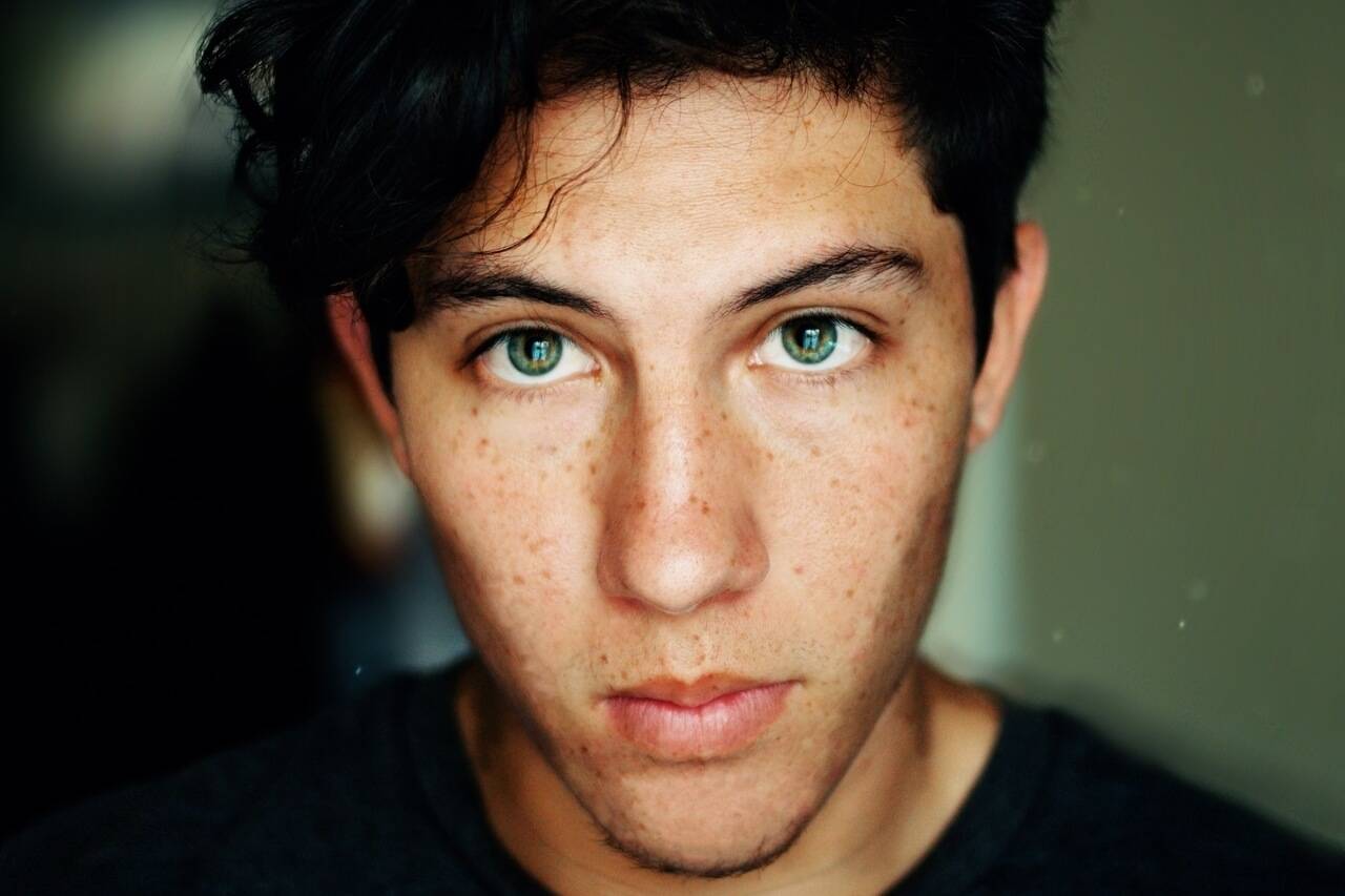 boy green eyes freckles