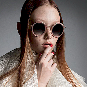 Model wearing VERA WANG sunglasses