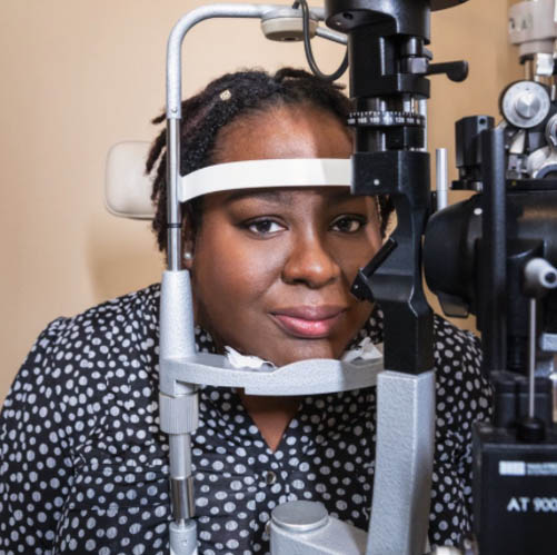 African American Female Doing an Eye Exam