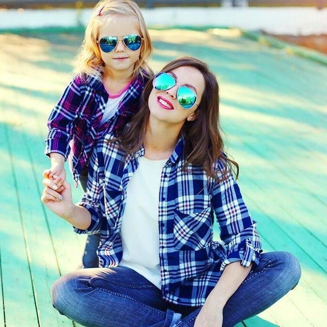Mother and Daughter Wearing Sunglasses Matching Outfits