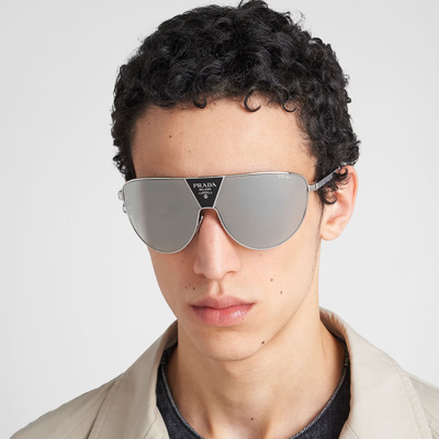 man wearing silver prada sunglasses
