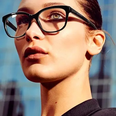 woman wearing michael kors eyeglasses 400×400 1