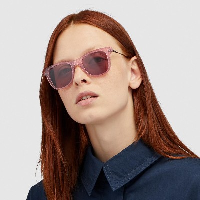 Coach Eyewear Woman wearing designer sunglasses