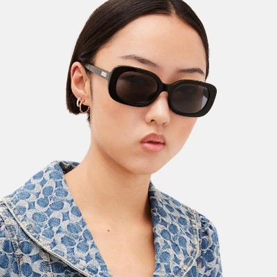 Coach Eyewear Woman with Black Coach Sunglasses