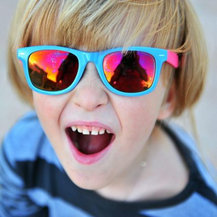 Portrait of a little boy wearing sunglasses
