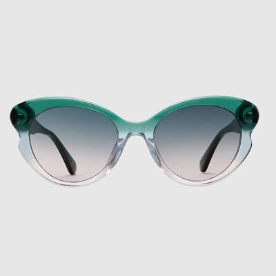 pair of green kate spade sunglasses.jpg