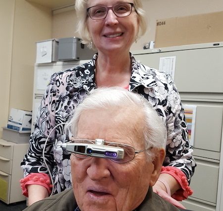 Image of Dr. Patti Fuhr with veteran Patient wearing Ocutech Falcon Autofocus Bioptic