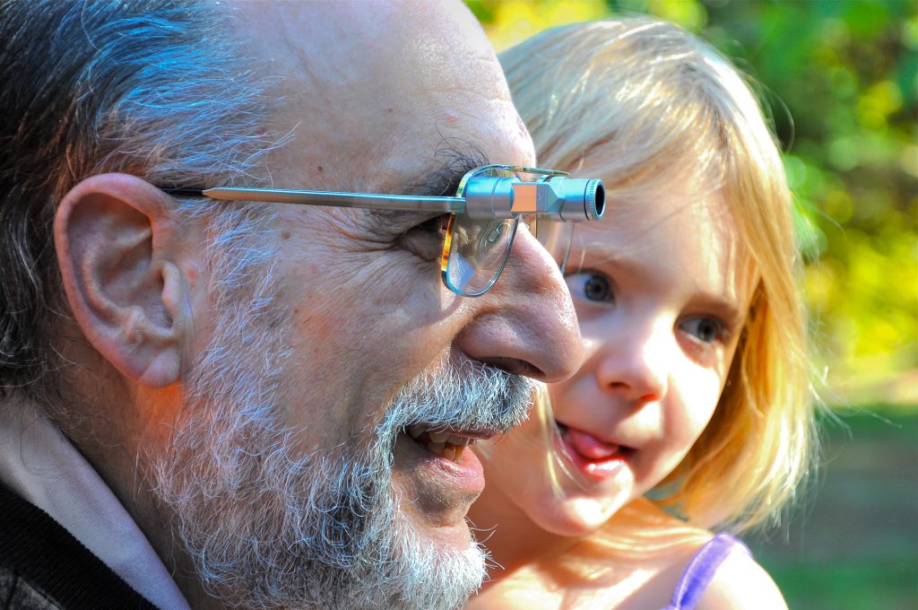grandfather with bioptic lenses wearing bioptic lenses