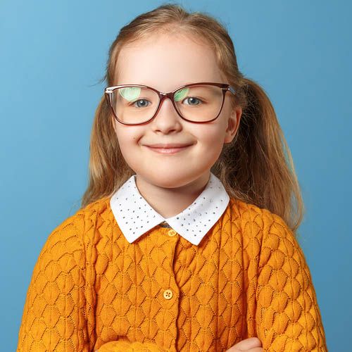happy girl orange sweater