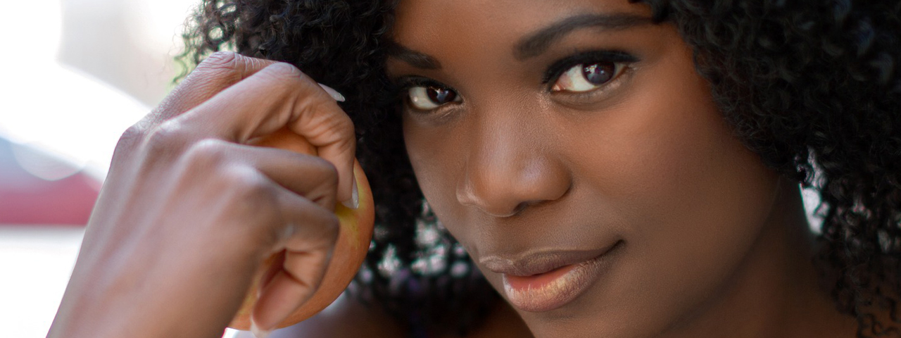 african american woman with pretty eyes, wearing scleral lenses